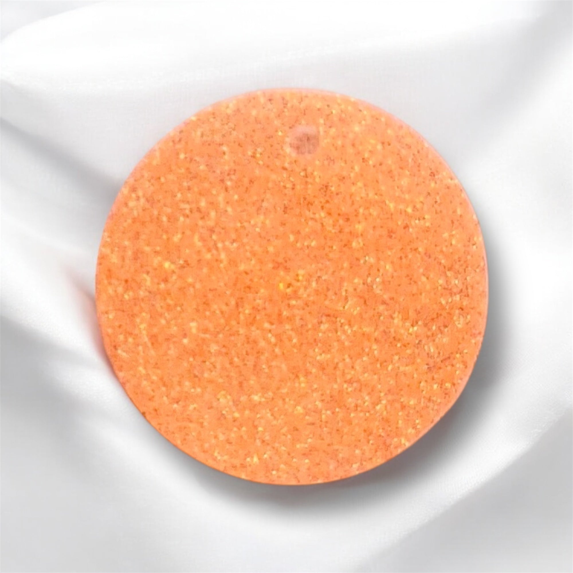 Chapita destellos naranja (pequeña)