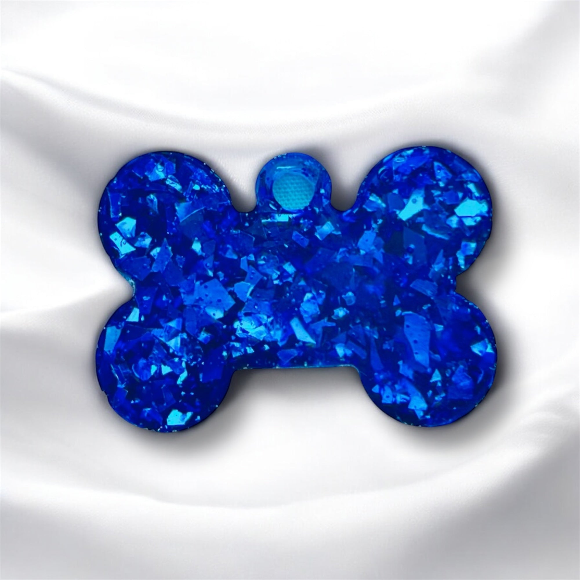 Chapita destellos azul (pequeña estándar)